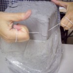 cutting block of clay